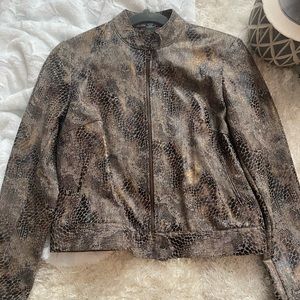 Snake print crop jacket.
